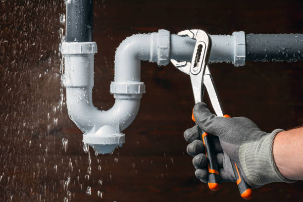 Professional Sewer Line Repair technician working in Fox Island, WA